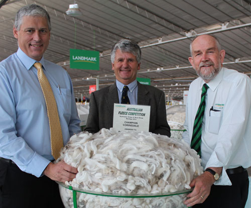BlazeAid secretary Dick Patterson (middle) with Competition organisers, Landmark agent Athol Frederick (right) and AWTA's Tim Steere (left) Fleece Competition organisers with BlazeAid Charity